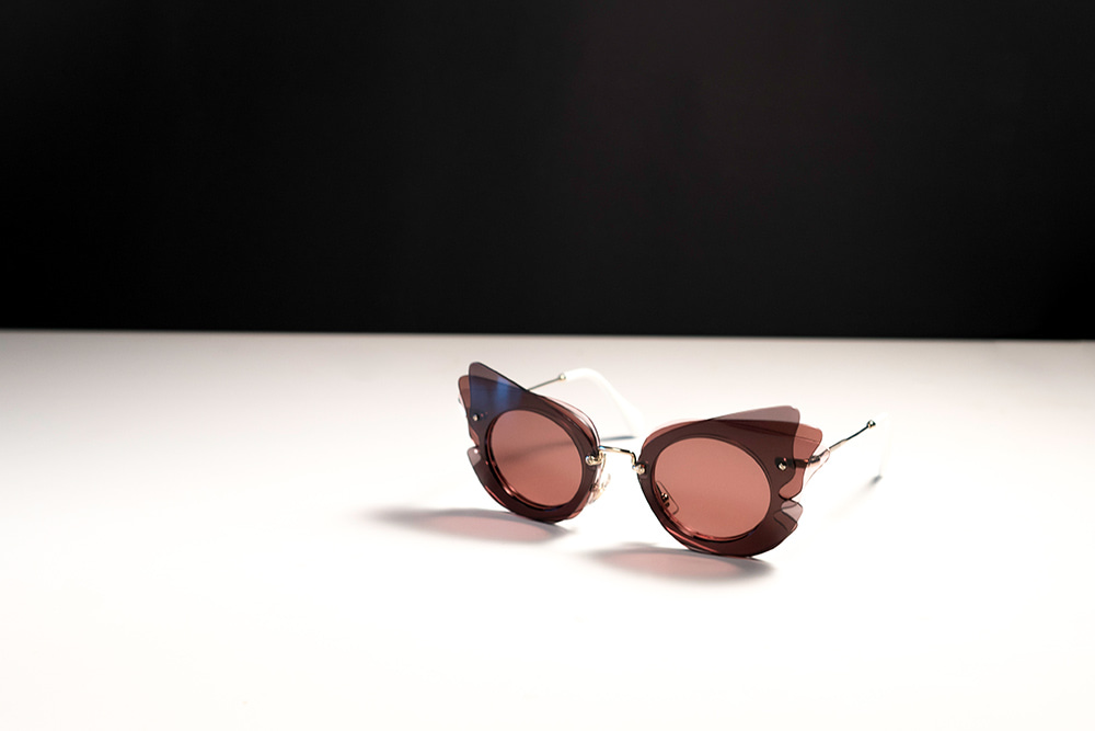 Pink Miu Miu Sunglasses in Pink Coloured frame